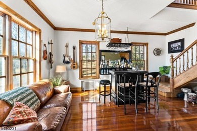 This stately, European-style brick home with striking - photo 13