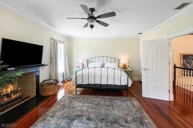 This stately, European-style brick home with striking - photo 19
