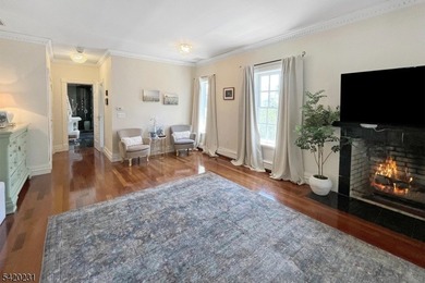 This stately, European-style brick home with striking - photo 20