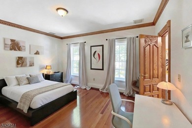 This stately, European-style brick home with striking - photo 23
