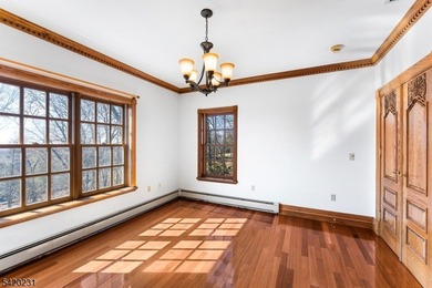 This stately, European-style brick home with striking - photo 26