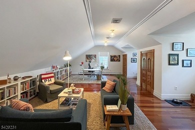 This stately, European-style brick home with striking - photo 27