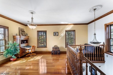 This stately, European-style brick home with striking - photo 28