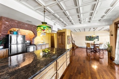 This stately, European-style brick home with striking - photo 30