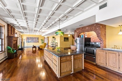 This stately, European-style brick home with striking - photo 32