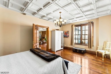 This stately, European-style brick home with striking - photo 35