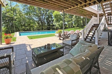 This stately, European-style brick home with striking - photo 40