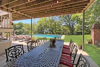 This stately, European-style brick home with striking - photo 41