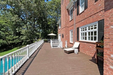 This stately, European-style brick home with striking - photo 45