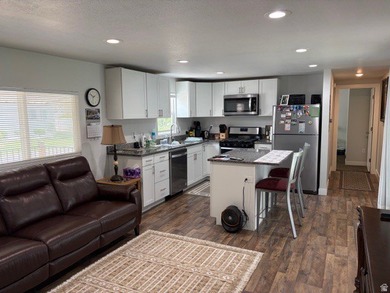Practically new home in a desirable 55+ manufactured community - photo 2