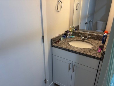 Practically new home in a desirable 55+ manufactured community - photo 4