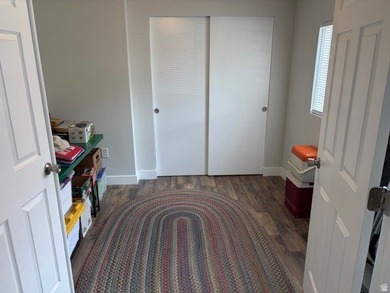 Practically new home in a desirable 55+ manufactured community - photo 6
