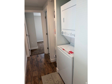 Practically new home in a desirable 55+ manufactured community - photo 7