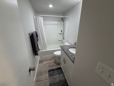Practically new home in a desirable 55+ manufactured community - photo 8