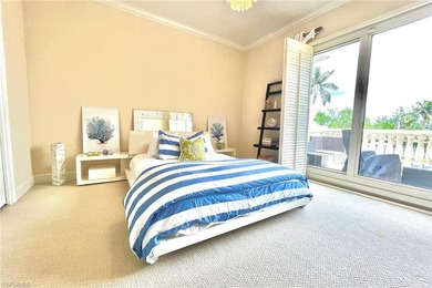 Experience coastal luxury at its finest in this rare three-story - photo 16