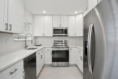 Welcome to this charming one-story residence in Boca Greens 7 - photo 18