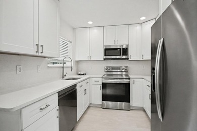 Welcome to this charming one-story residence in Boca Greens 7 - photo 20