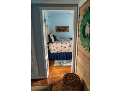 Welcome to this charming beach-style retreat - offered fully - photo 11