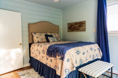 Welcome to this charming beach-style retreat - offered fully - photo 12
