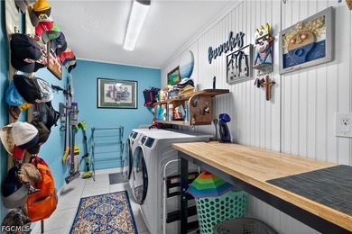 Adorable home ideally located just three lots from the river and - photo 30