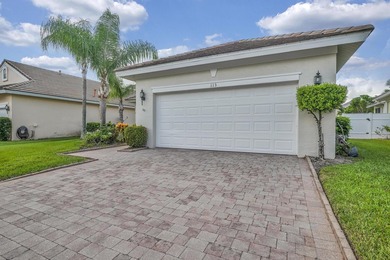 Nestled in the desirable gated community of Magnolia Lakes in - photo 2