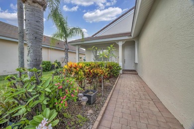 Nestled in the desirable gated community of Magnolia Lakes in - photo 3