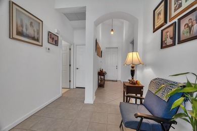 Nestled in the desirable gated community of Magnolia Lakes in - photo 4