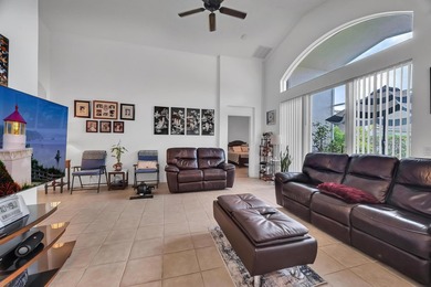 Nestled in the desirable gated community of Magnolia Lakes in - photo 6