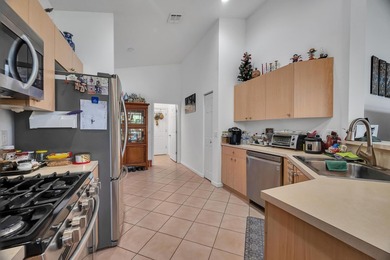 Nestled in the desirable gated community of Magnolia Lakes in - photo 9
