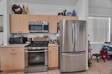 Nestled in the desirable gated community of Magnolia Lakes in - photo 10