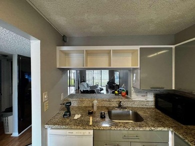 Welcome to this 2-bedroom, 2-bathroom condo located in the - photo 5