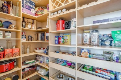 Experience luxury in this premier, downtown-facing condo at the