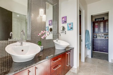 Experience luxury in this premier, downtown-facing condo at the