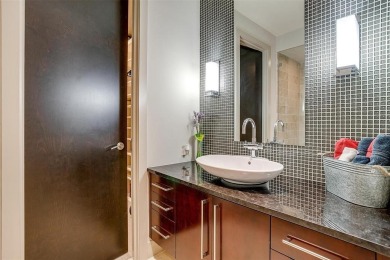 Experience luxury in this premier, downtown-facing condo at the