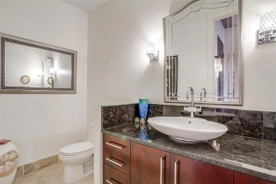 Experience luxury in this premier, downtown-facing condo at the