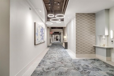 Experience luxury in this premier, downtown-facing condo at the