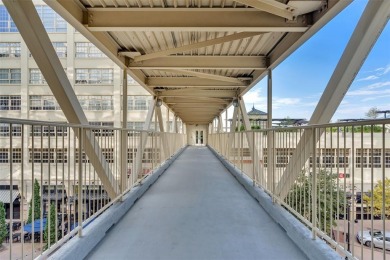 Experience luxury in this premier, downtown-facing condo at the