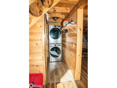Rustic charm meets everyday convenience in this Amish-built log - photo 11