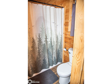 Rustic charm meets everyday convenience in this Amish-built log - photo 14