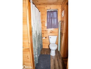 Rustic charm meets everyday convenience in this Amish-built log - photo 15
