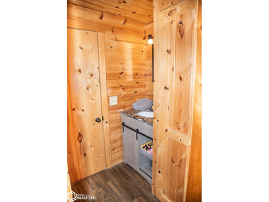 Rustic charm meets everyday convenience in this Amish-built log - photo 16