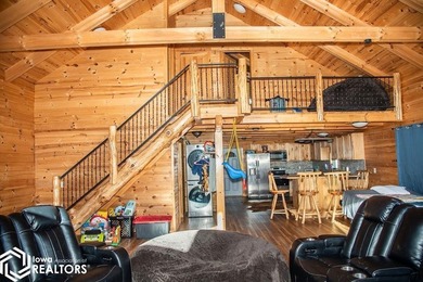 Rustic charm meets everyday convenience in this Amish-built log - photo 17