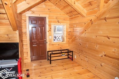 Rustic charm meets everyday convenience in this Amish-built log - photo 20