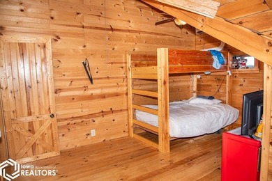 Rustic charm meets everyday convenience in this Amish-built log - photo 21