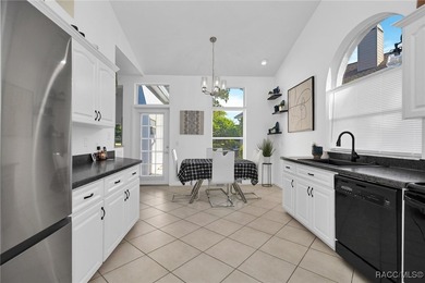 Enter to vaulted ceilings, beautiful bamboo floors in living and - photo 9