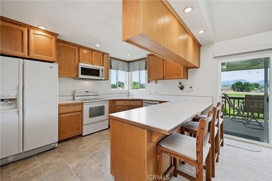 Meticulously maintained and beautifully landscaped, this - photo 13
