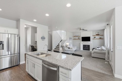2 STORY UPGRADED IVORY BUILT GEM- Dreamy Great room/kitchen - photo 18
