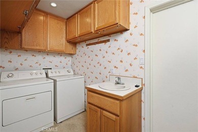 Meticulously maintained and beautifully landscaped, this - photo 19