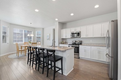 2 STORY UPGRADED IVORY BUILT GEM- Dreamy Great room/kitchen - photo 19