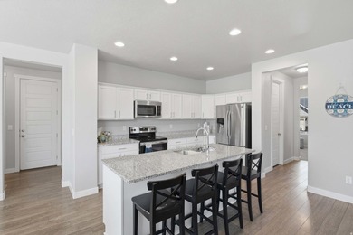 2 STORY UPGRADED IVORY BUILT GEM- Dreamy Great room/kitchen - photo 20